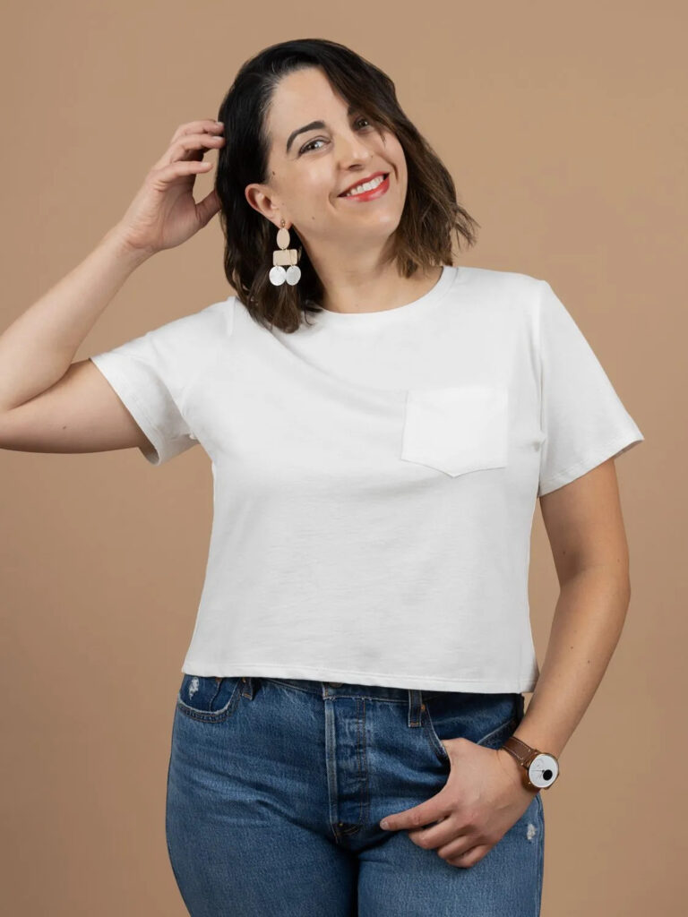 Woman wearing white crew neck t-shirt with chest pocket